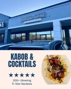 Exterior of a North Indian restaurant featuring a sign for Mystic Spice, with parked cars in front, and an advertisement highlighting kabobs and cocktails alongside an image of a dish garnished with onions and herbs.