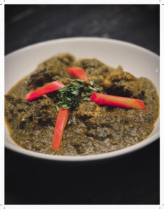 Hariyali Chicken dish with green sauce made from mint, coriander, and spinach