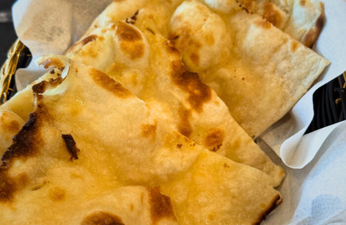 Freshly baked plain Indian naan bread